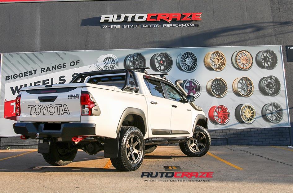TOYOTA HILUX 4WD BEAST BLACK MACHINED WITH DARK TINT